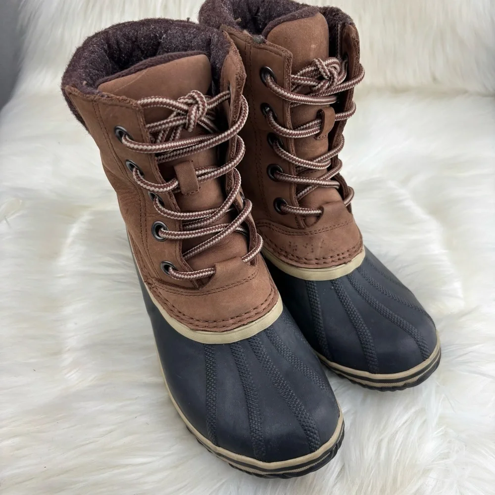 Sorel Tan and Black Lace-Up Boots